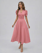 Elara Midi Dress in soft pink with V-neckline, puffed sleeves, and cinched waist by Lauven for elegant occasions.