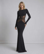 Noir Maxi Dress - Black long sleeve dress with sheer mesh waist panel by Lauven, creating a sleek, sculptural silhouette.