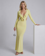 Zahara Maxi Dress in yellow with ruffle V-neck and open back, showcasing bodycon fit and elegant design by Lauven.