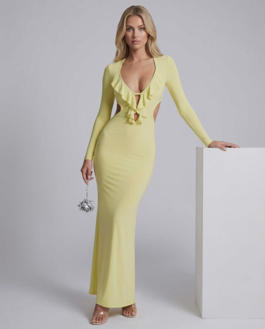 Zahara Maxi Dress in yellow with ruffle V-neck and open back, showcasing bodycon fit and elegant design by Lauven.