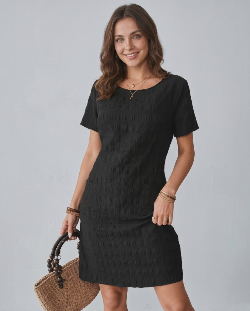 Avelin Mini Dress by Lauven, featuring textured fabric, round neckline, short sleeves, and a fresh modern look.