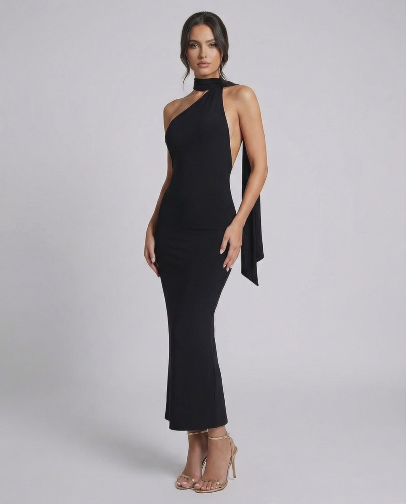 Celeste Maxi Dress by Lauven, sleek black halter neck evening dress with a modern silhouette.