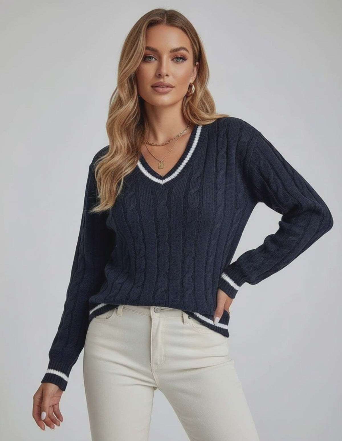Monaco Sweater by Lauven – Women’s V-Neck Cable Knit in deep navy with striped trim and long sleeves.