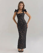 Noirelle Maxi Dress featuring intricate lace, square neckline, sleeveless design, and Lauven brand elegance.
