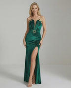 Green Celeste Maxi Dress by Lauven featuring luxurious velvet, a high slit, and elegant styling for sophisticated occasions.