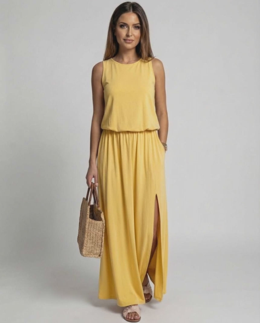 Solara Maxi Dress in vibrant yellow, featuring a sleeveless silhouette, side slit, and relaxed fit by Lauven.