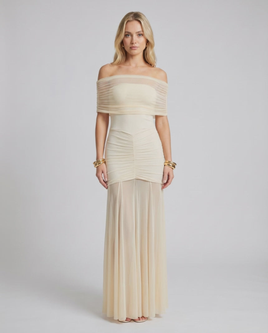 Noirline Maxi Dress featuring an off-shoulder neckline, ruched bodice, flowing lower panel, by Lauven.
