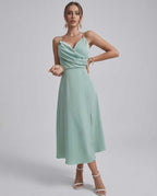 Selene Midi Dress in mint green satin, featuring refined spaghetti straps and a draped bodice, perfect for weddings by Lauven.