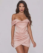 Lauven Orion Mini Dress in blush satin, off-shoulder neckline, elegant body-skimming silhouette with draped fold design.