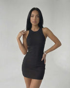 Sienna Mini Dress in Black Ribbed Knit, sleeveless bodycon dress by Lauven, sleek modern style with textured finish.