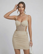 Isla Mini Dress by Lauven featuring a sleek cut-out, slim fit, and ruched design for a modern look.