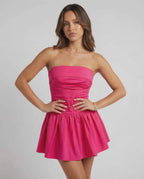 Azalea Mini Dress by Lauven, vibrant pink strapless A-line silhouette perfect for summer events.