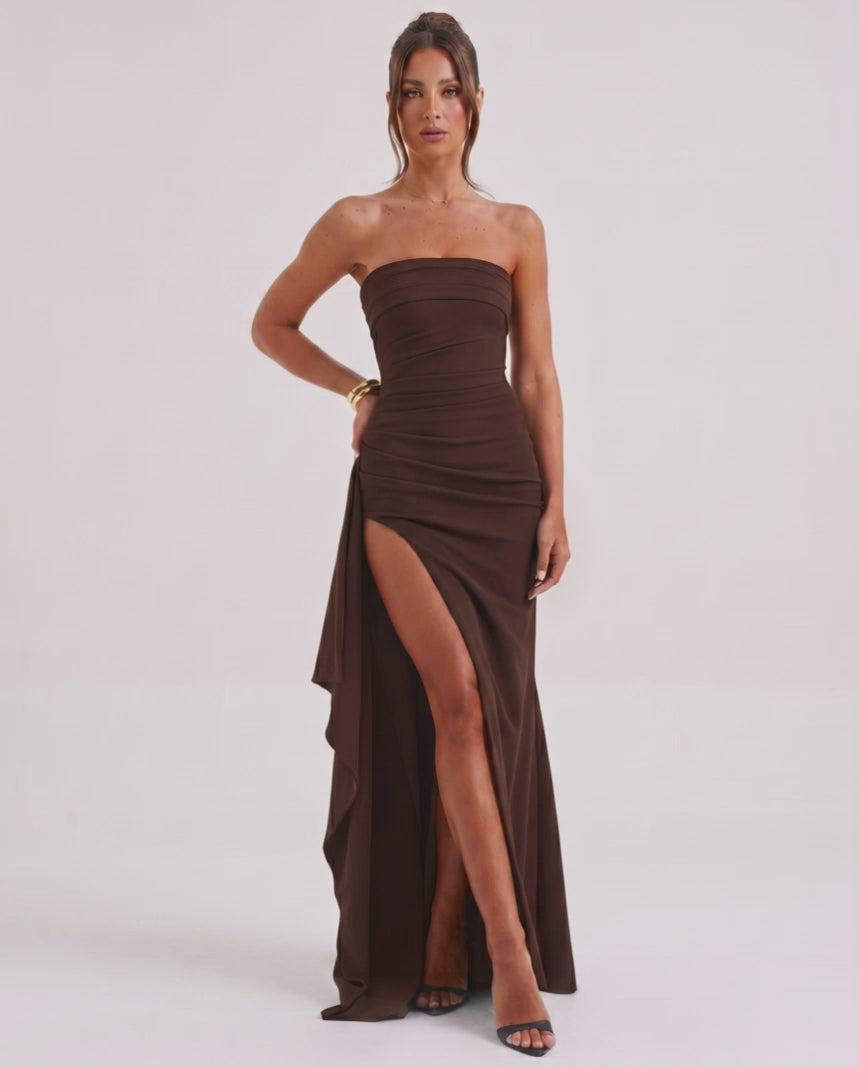 Solenne Maxi Dress featuring a strapless design, dramatic side slit, and luxurious brown fabric by Lauven.