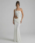 Elara Maxi Dress featuring asymmetrical draping, backless design, and elegant silhouette by Lauven.
