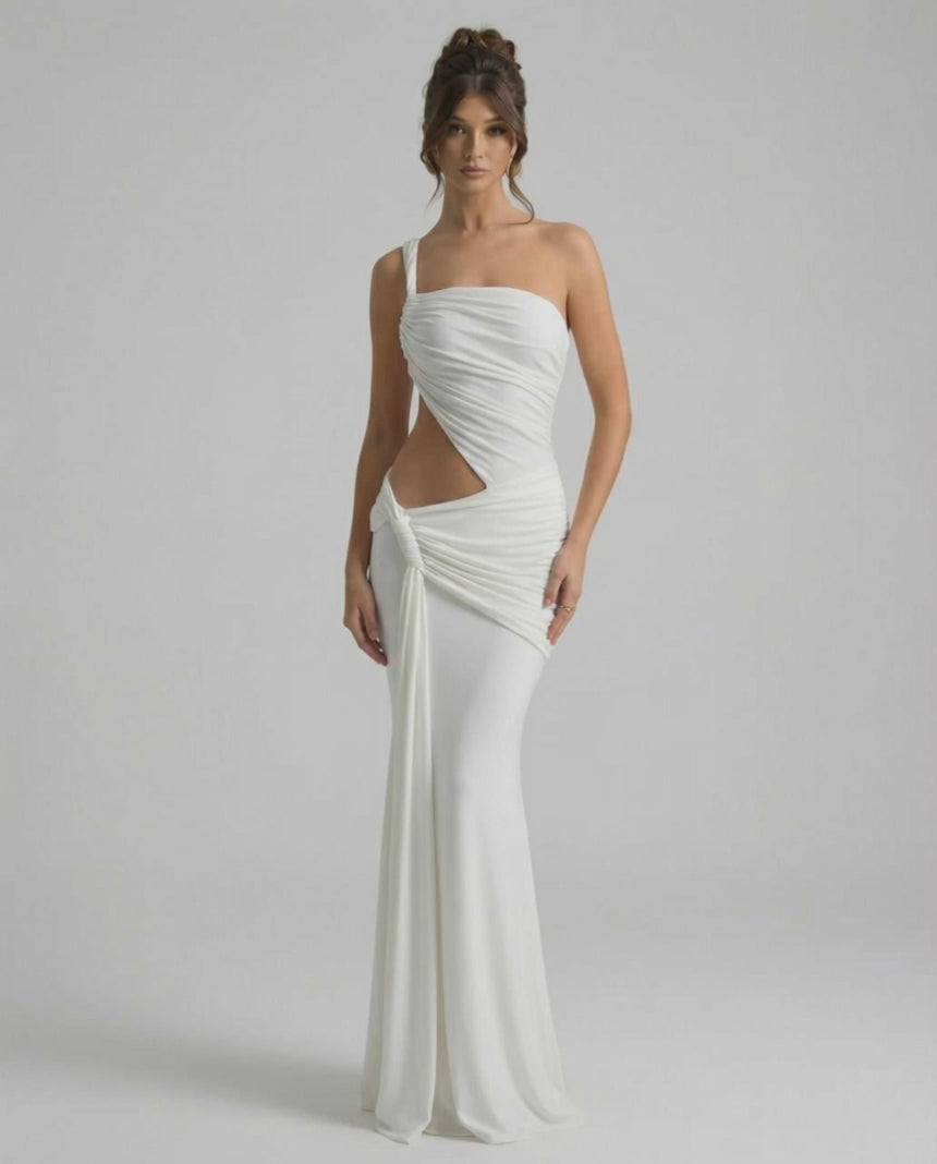 Elara Maxi Dress featuring asymmetrical draping, backless design, and elegant silhouette by Lauven.
