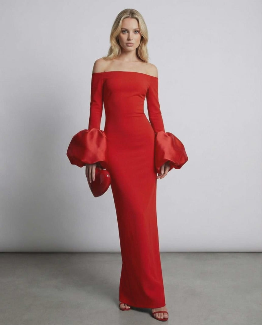 Valencia Maxi Dress featuring off the shoulder neckline, bold red color, and elegant bell sleeves by Lauven.