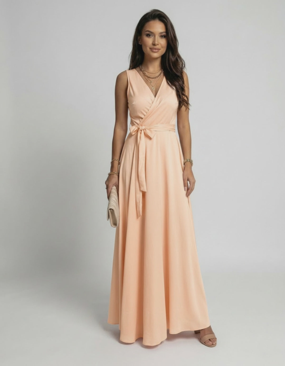 Serena Maxi Dress by Lauven in soft peach, featuring a V-neck silhouette and flowing length for elegant style.