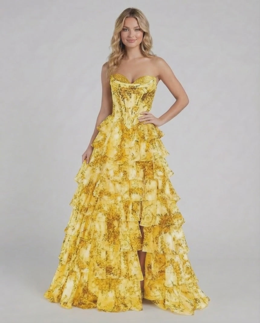 Solara Maxi Dress by Lauven, a stunning yellow floral tiered chiffon gown with a sweetheart neckline and layered skirt.