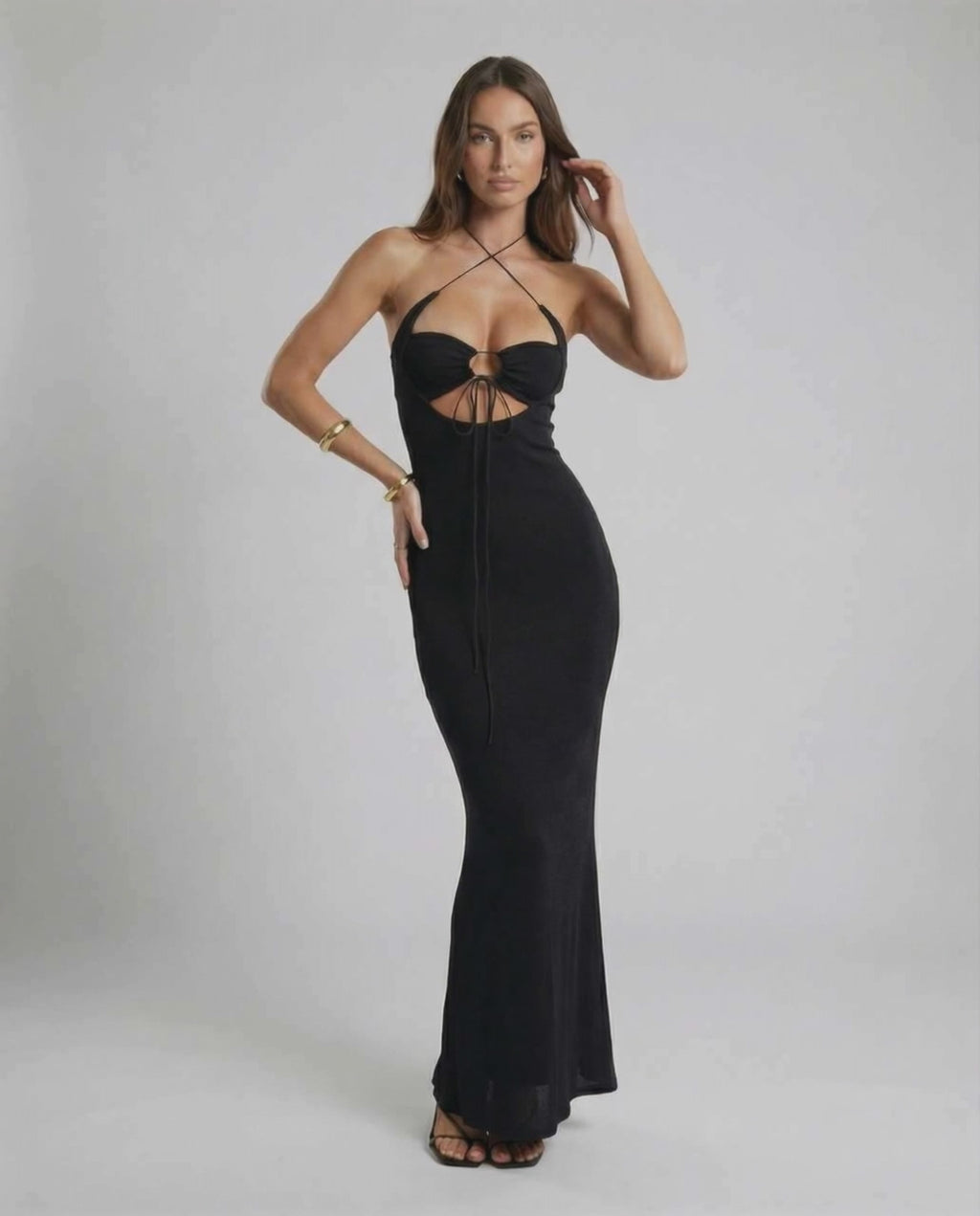 Elysia Maxi Dress by Lauven – Elegant black crisscross cutout halter midi dress showcasing modern design details.