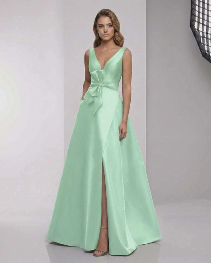 Elaris Maxi Dress in mint green satin featuring A-line elegance and modern wrap detail by Lauven.