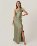 Solene Maxi Dress – One-shoulder satin dress in sage green with side slit, by Lauven, creating an elegant occasion look.