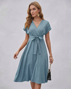 Serene Midi Dress featuring pleated fabric, V-neck, self-tie belt by Lauven, perfect for stylish day-to-evening wear.