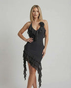 Noir Mini Dress by Lauven with ruffle detail and asymmetric hemline in classic black.