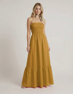 Valora Maxi Dress - Mustard yellow strapless maxi dress with smocked bodice by Lauven, perfect for summer. 