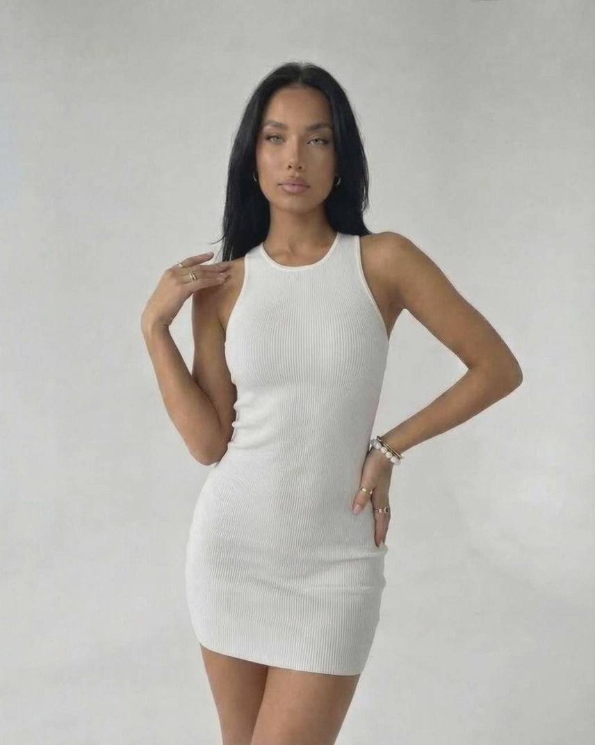 Orion Mini Dress - Ribbed Knit White Mini Dress from Lauven with cross back detail, featuring a sleek silhouette.