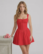 Ruby Mini Dress by Lauven in vibrant red, featuring a structured bodice and flared skirt.