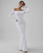 Lauven Orion Maxi Dress in classic white, featuring off-shoulder long sleeves and smooth stretch fabric.