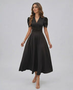 Noire Midi Dress by Lauven, elegant black midi dress with puff sleeves and V-neckline for sophisticated occasions.