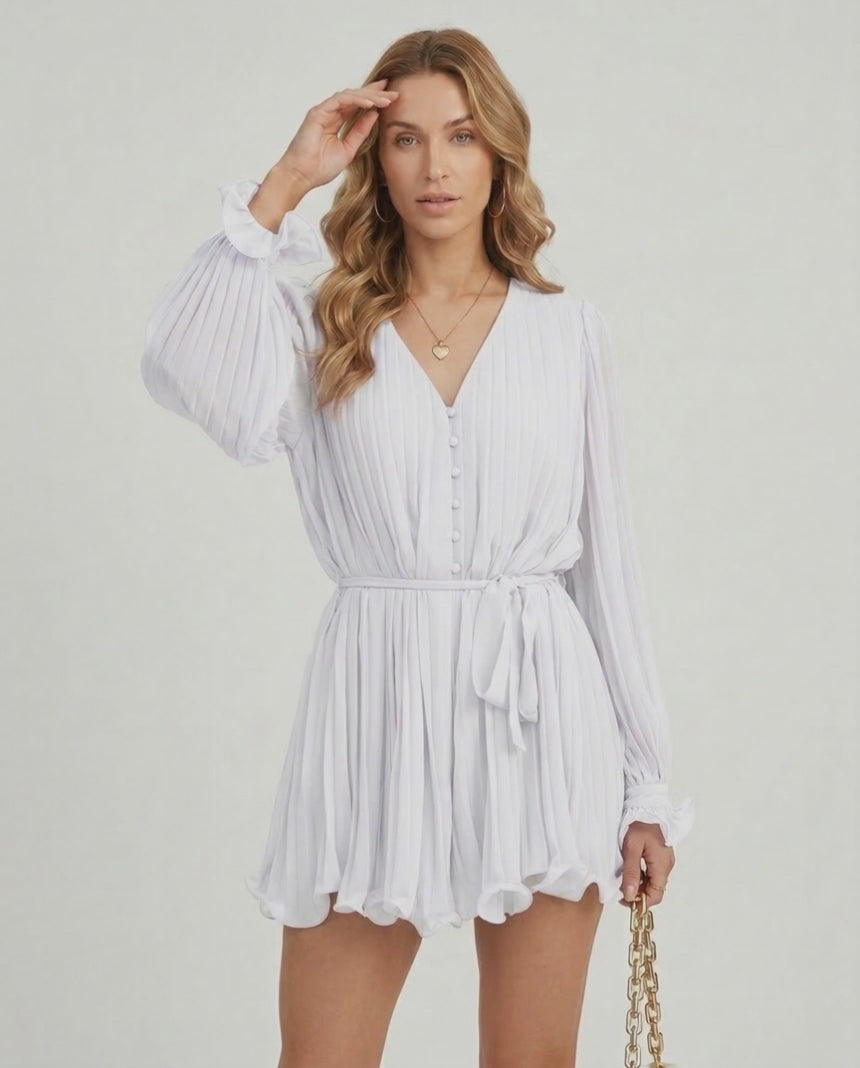 Lauven Luna Mini Dress in classic white pleated chiffon with elegant details and flowing silhouette.