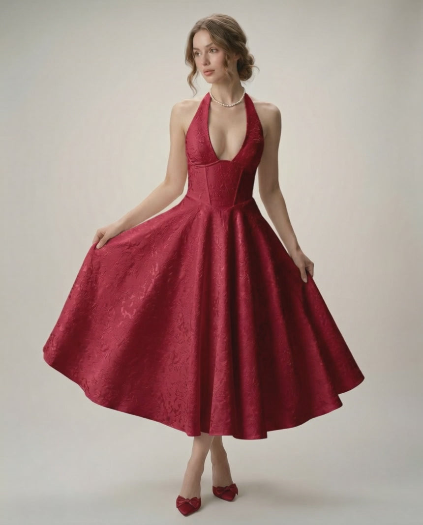 Elara Midi Dress in rich red, featuring a halter neckline, A-line silhouette, and structured fit by Lauven.