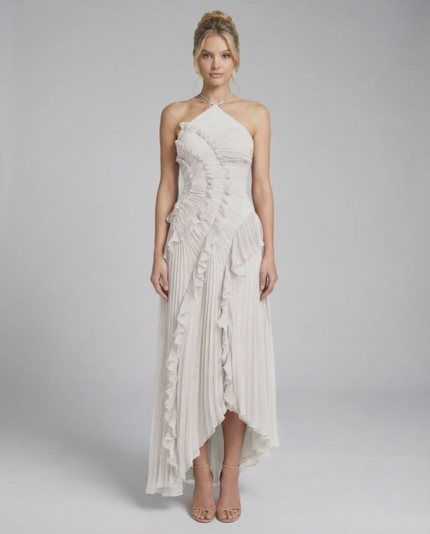 Seren Maxi Dress by Lauven - Classic ivory pleated halter gown with ruffle accents and asymmetrical high-low hem.