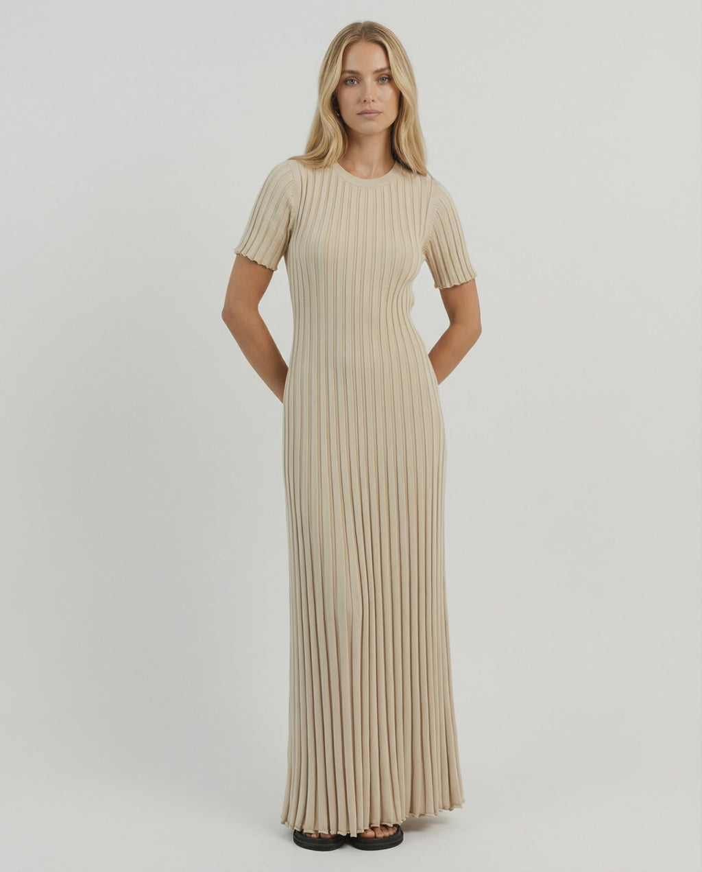 Celeste Maxi Dress by Lauven features elegant ribbed knit in beige with a flowing ankle-length silhouette.