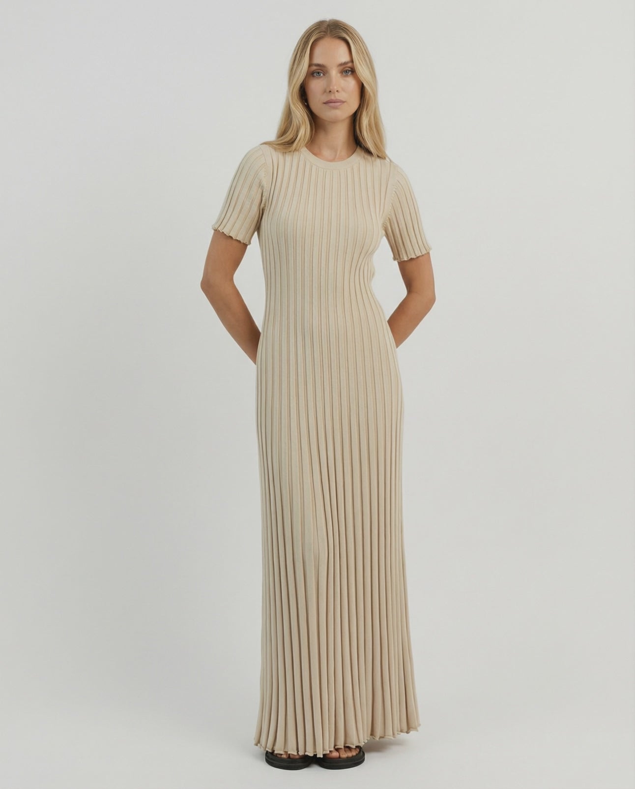 Celeste Maxi Dress by Lauven features elegant ribbed knit in beige with a flowing ankle-length silhouette.