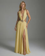 Heliora Maxi Dress by Lauven in radiant yellow with plunging V-Neck and sculptural embellishment.