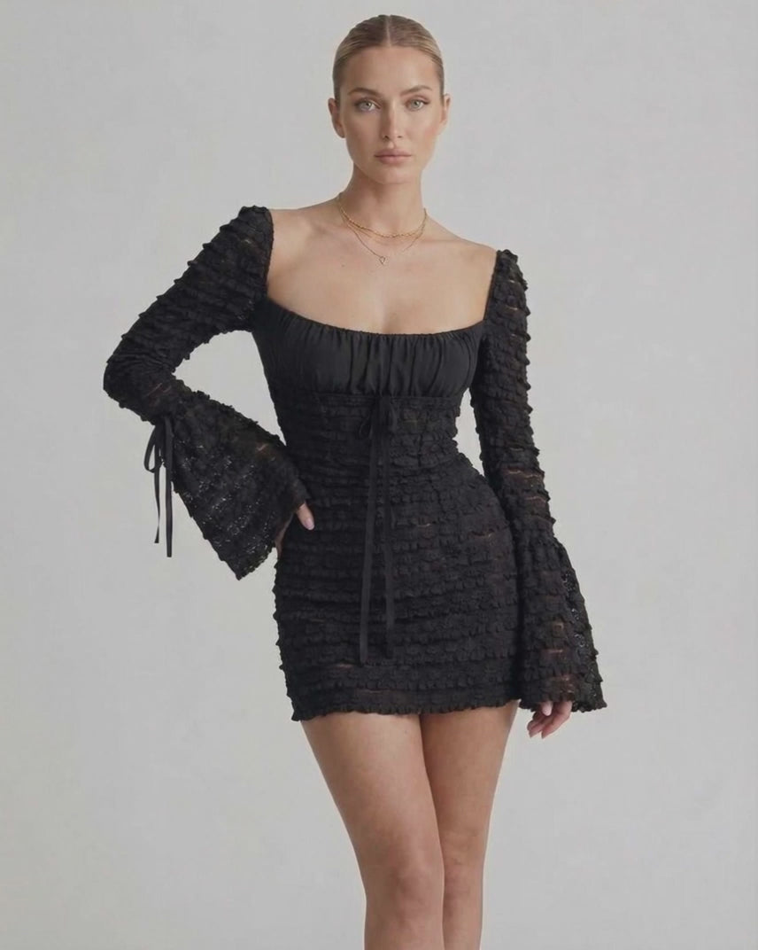 Luna Mini Dress by Lauven featuring elegant sheath silhouette, flare sleeves, and textured black fabric for modern luxury.