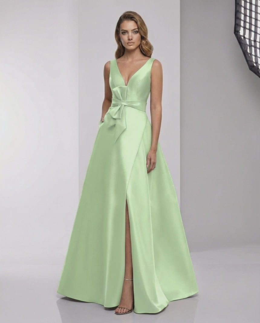 Calytrix Maxi Dress in mint green satin with wrap slit and bow detail by Lauven for elegant formal occasions.