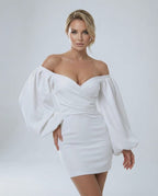 Ivory Mini Dress by Lauven, showcasing an off-shoulder design and puff sleeves in luxurious satin.
