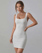 Luna Mini Dress by Lauven, white ribbed cotton blend, sleek fit, modern square neckline, stylish dress for any occasion.