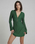 Emerald Mini Dress by Lauven, showcasing pleated long sleeves and a deep V-neck in rich green.