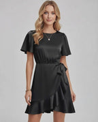 Lauven Noir Mini Dress featuring a sleek satin finish, ruffle hem, and flattering tie waist, perfect for elegant occasions.