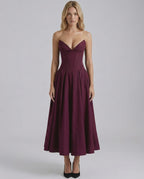 Aveline Midi Dress featuring a fitted bodice, V-neckline, and a flowing skirt by Lauven, perfect for elegant occasions.