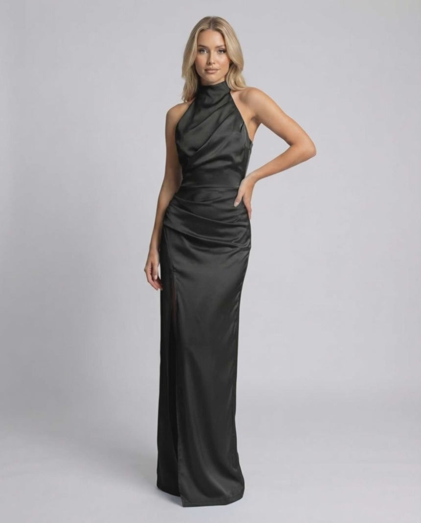 Noiré Maxi Dress by Lauven - Black satin halter neck dress with high slit, showcasing elegance and fluid silhouette.