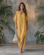 Solara Maxi Dress in lightweight chiffon, V-neck with fluid movement, ideal for warm weather. By Lauven.
