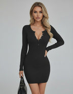 Monaco Mini Dress by Lauven – Black ribbed bodycon mini dress with long sleeves and button front.