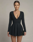 Vivian Mini Dress featuring deep V-neckline, flared skirt in classic black by Lauven, perfect for timeless elegance.
