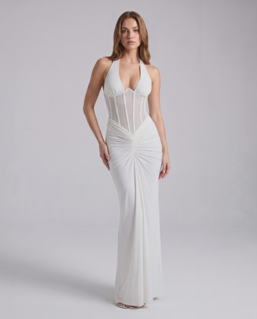 Velmira Maxi Dress by Lauven in white, featuring halter neck, bodycon fit, sheer mesh panel and luxe polyester-spandex blend.